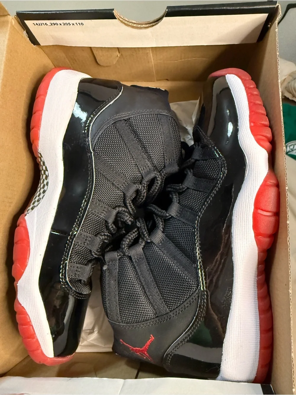 Jordan womans Black and Red High-Top Sneakers
